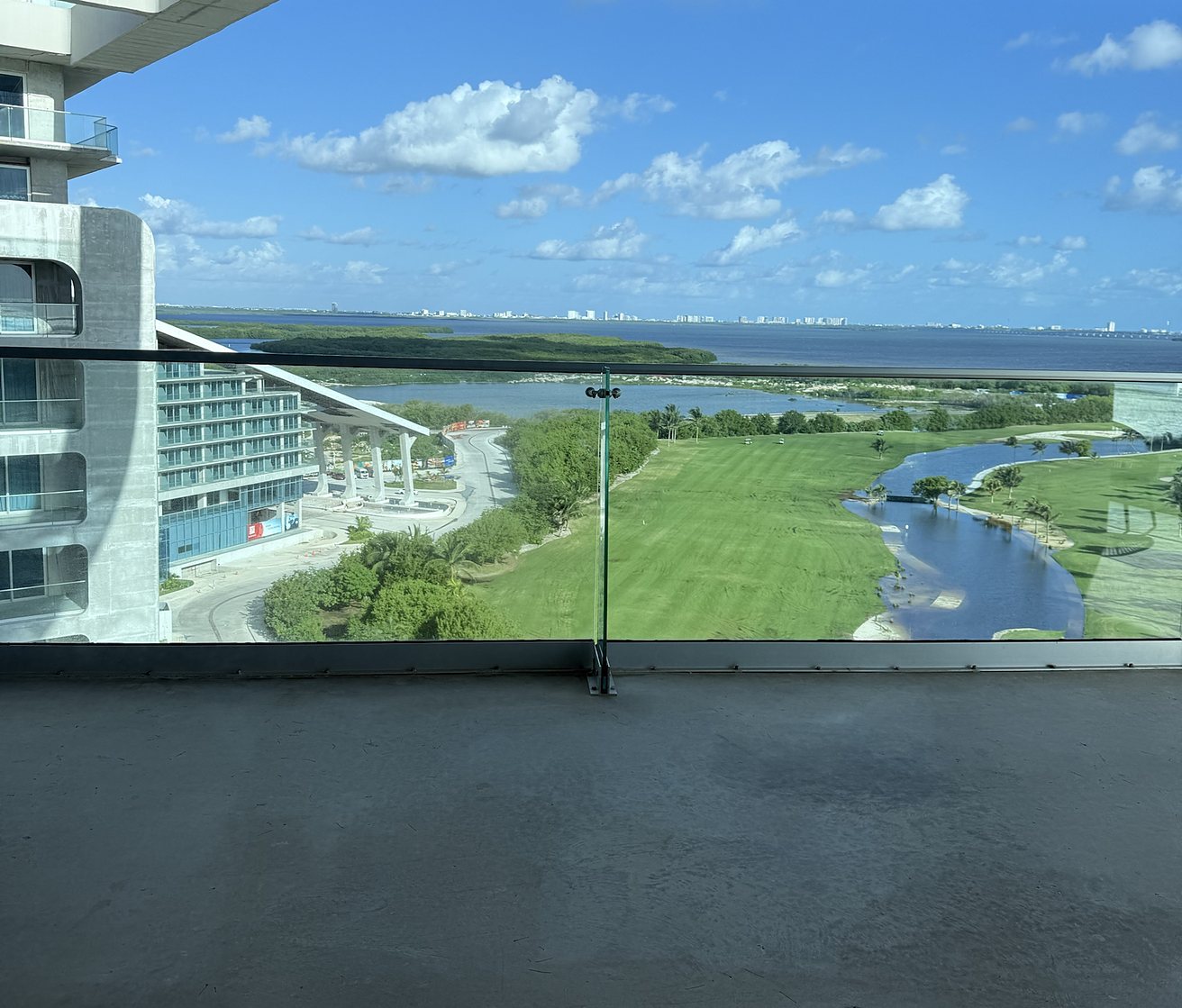 The terrace in daylight. The view is the reason to book the room, and there is very little out there to sit on.